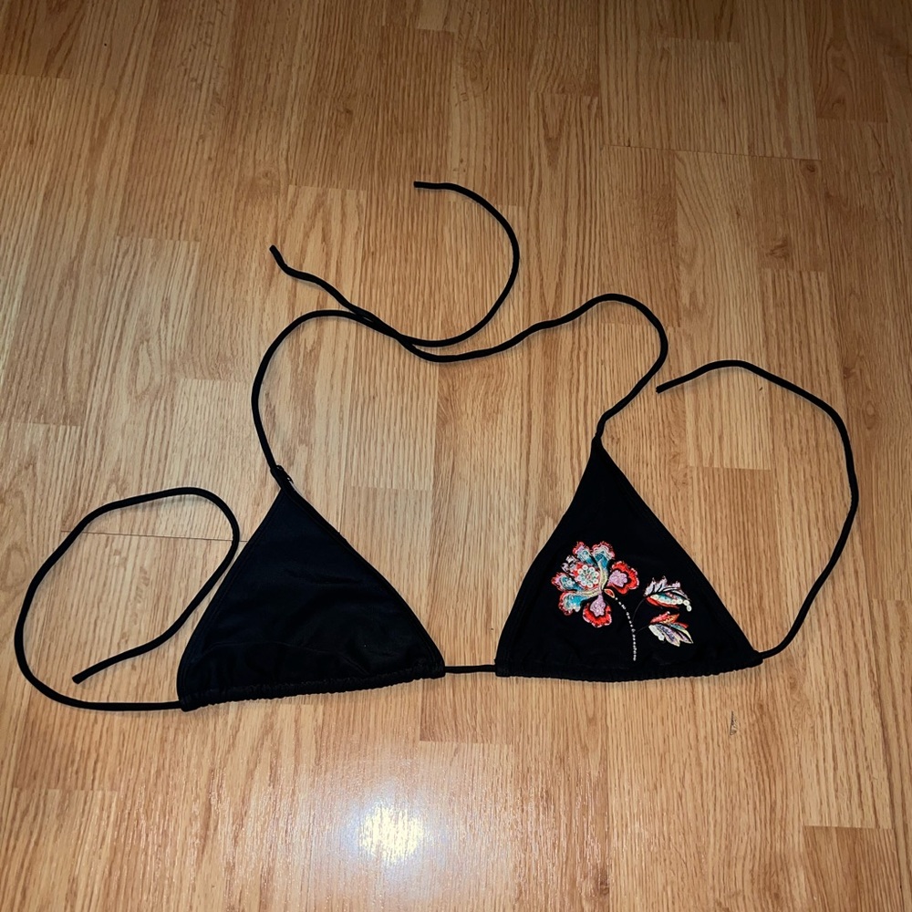 Embroidered bikini top.